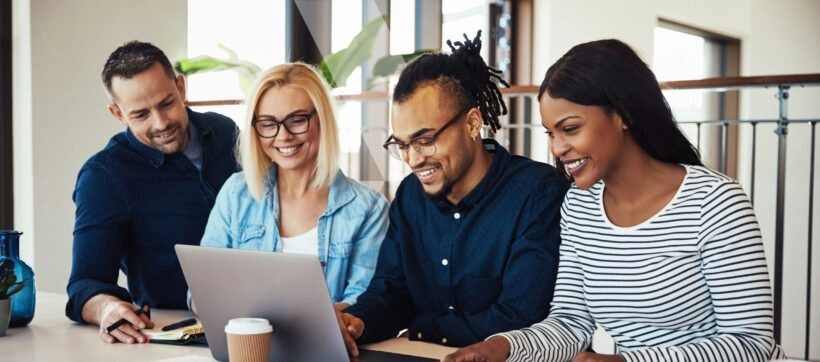 Team collaborating to boost employee engagement during business automation project